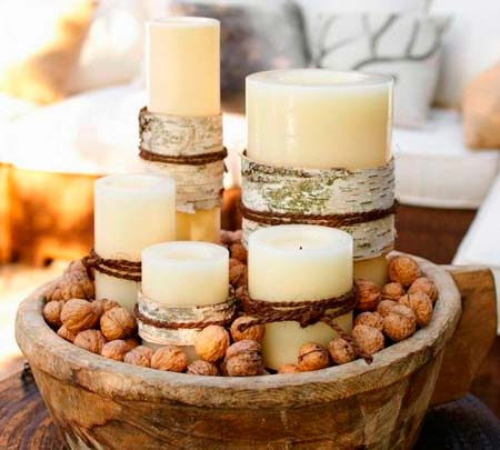 Decorated candles and nuts.