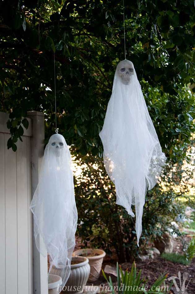 Hang skull ghosts from your front porch.