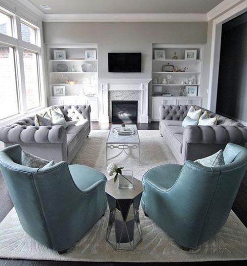 Most typical strategies for decorating a living room is to use symmetry.