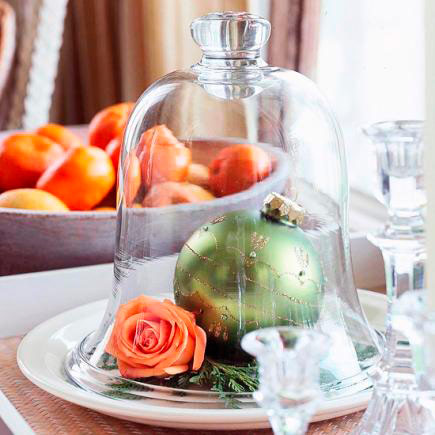 Reuse a decorative bell to decorate the table these holidays.