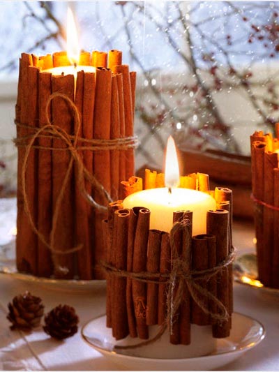 Tie cinnamon sticks to the candles and enjoy the scent of Christmas.