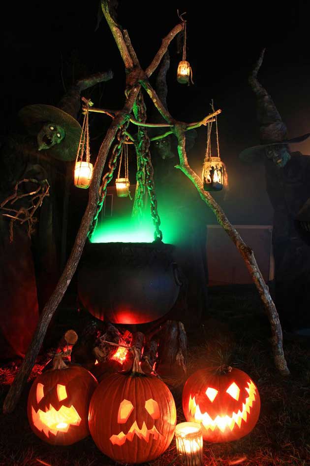 Witches cauldron and hanging luminaries.