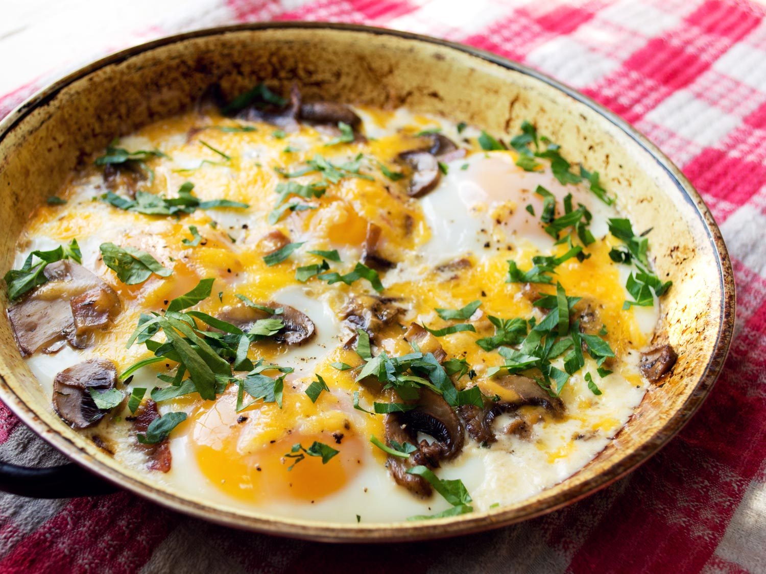 Baked Eggs With Mushrooms, Cheddar, and Ham Recipe