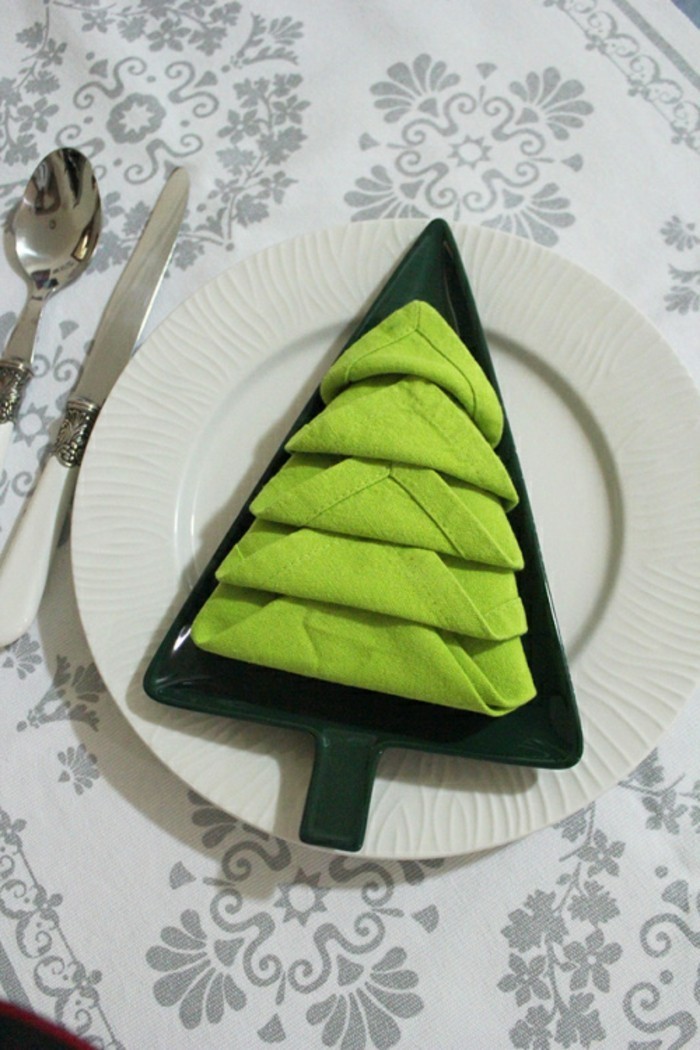 Fold napkins for Christmas - put them in a special shape