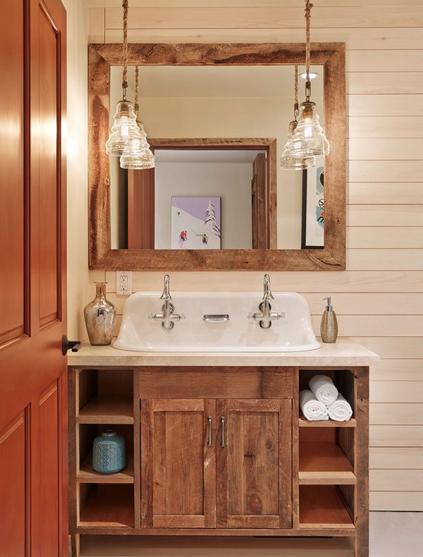 The bathroom is designed with wood elements