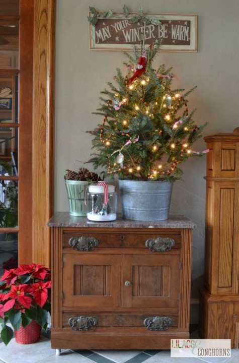 #Small #Christmas #Tree tree in a tin bucket with berries and lights