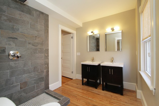 A beautiful bathroom transformation in a classic Newport, RI home. Griff updated the lighting and wiring. Photo by @melissaquintal