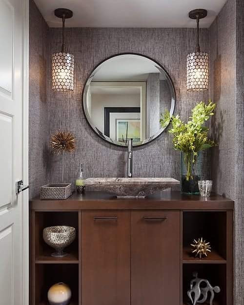 Dress up your powder room with textured wall paper and hanging lights!  Pic by leighawagner_realtor
