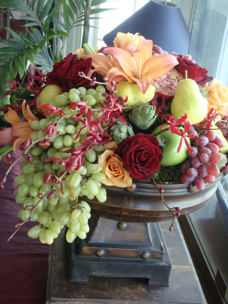 Fruit and Flower Arrangements as Centerpieces.
