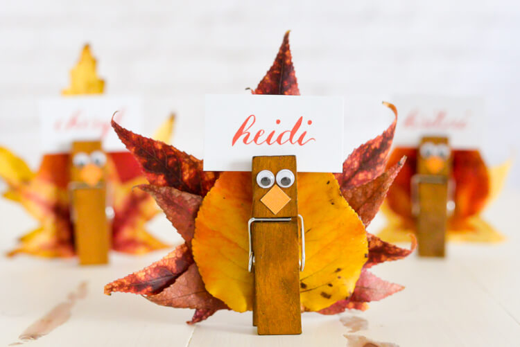 Turkey place card holders are super simple to make -- gather fall leaves.