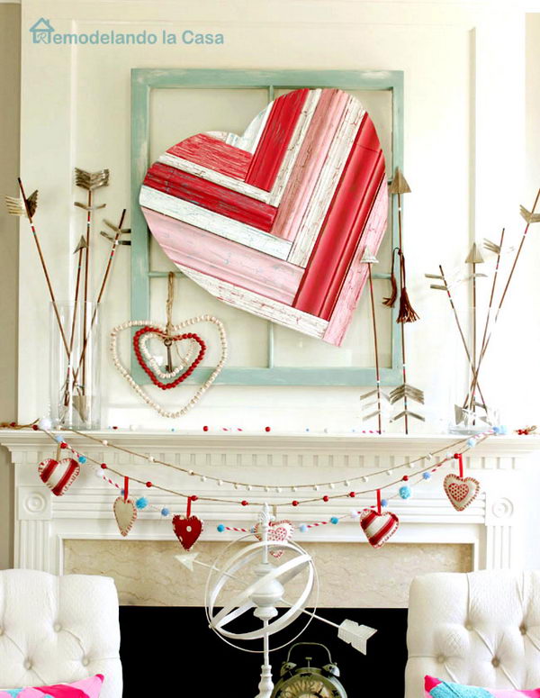 A matching heart garland hangs from the mantel.