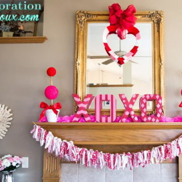 Red and white patterned “XOXO” sign as well as the tassel garland.