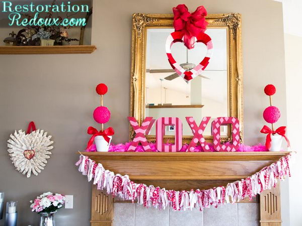 Red and white patterned “XOXO” sign as well as the tassel garland.  Valentine’s Day Garlands Decorations