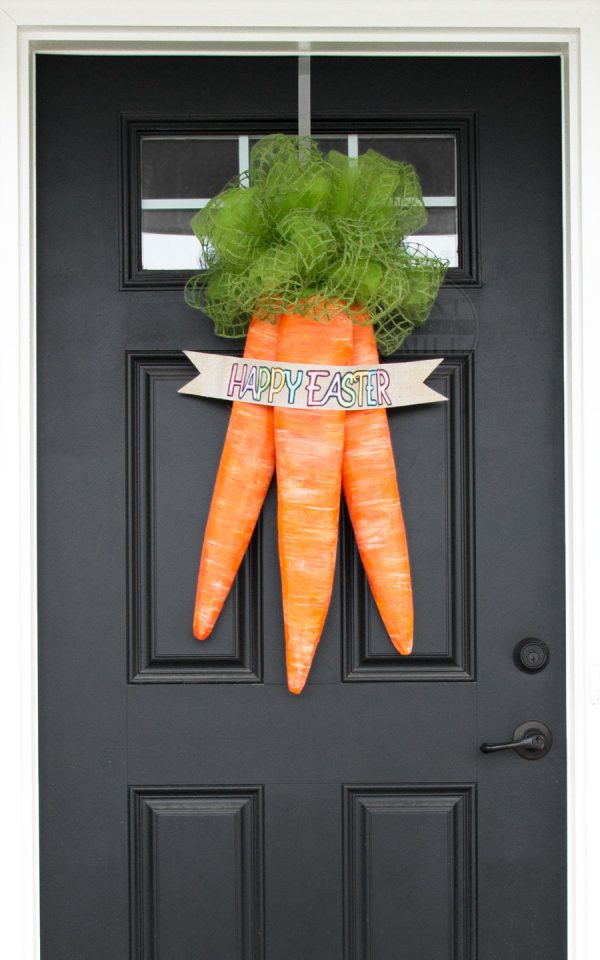 Giant carrots wreath for front door decor.