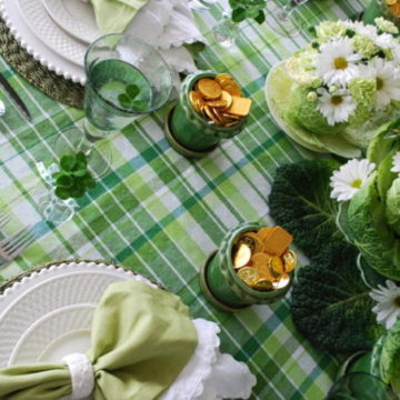Gorgeous table decor with green and white plaid tablecloth.