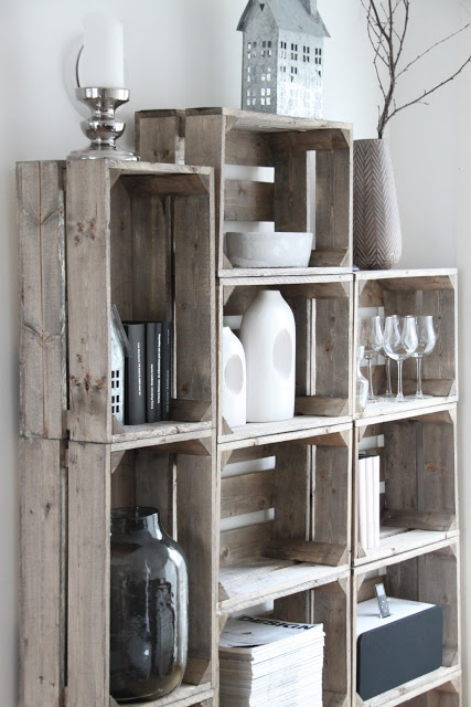 Brilliant shelves made of old crates stacked.
