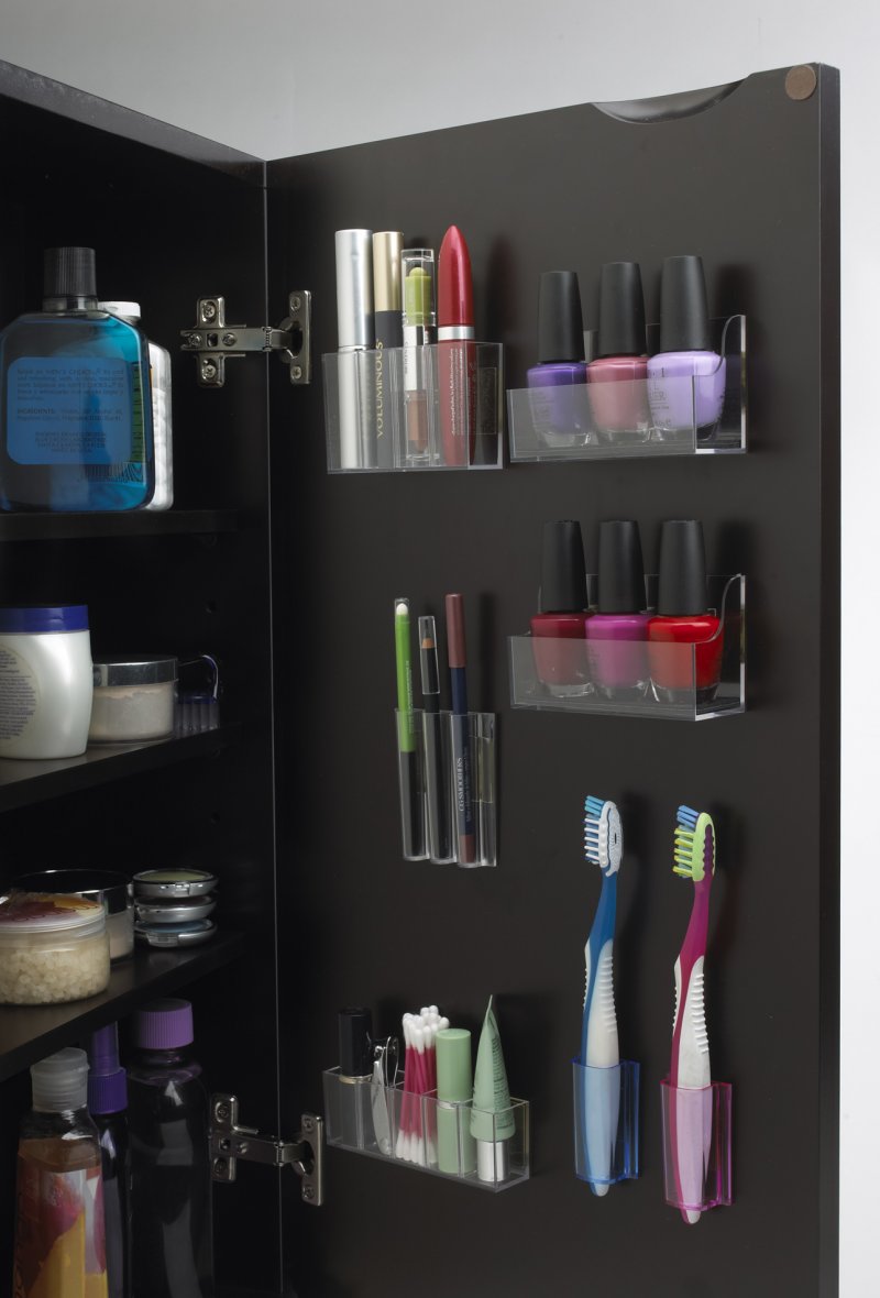 Cabinet door to keep lipsticks and toothbrushes.