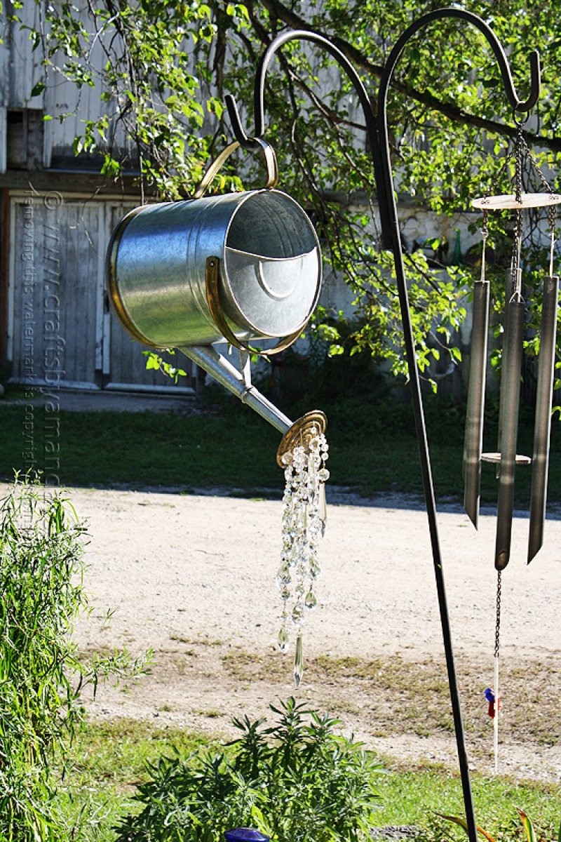 Chandelier crystals to an old watering can.