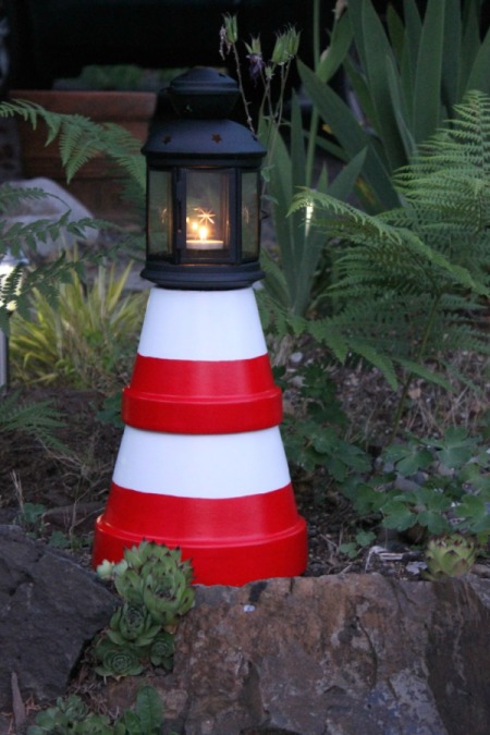 Create a lighthouse using clay pots.