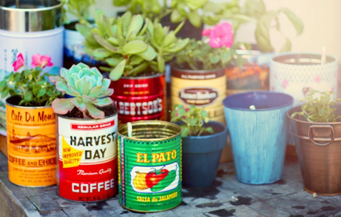 Decorate your garden cheaply with recycled tins.
