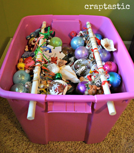 Hang ornaments in bins.