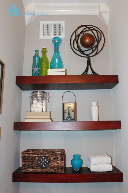 Install shelves above the toilet.