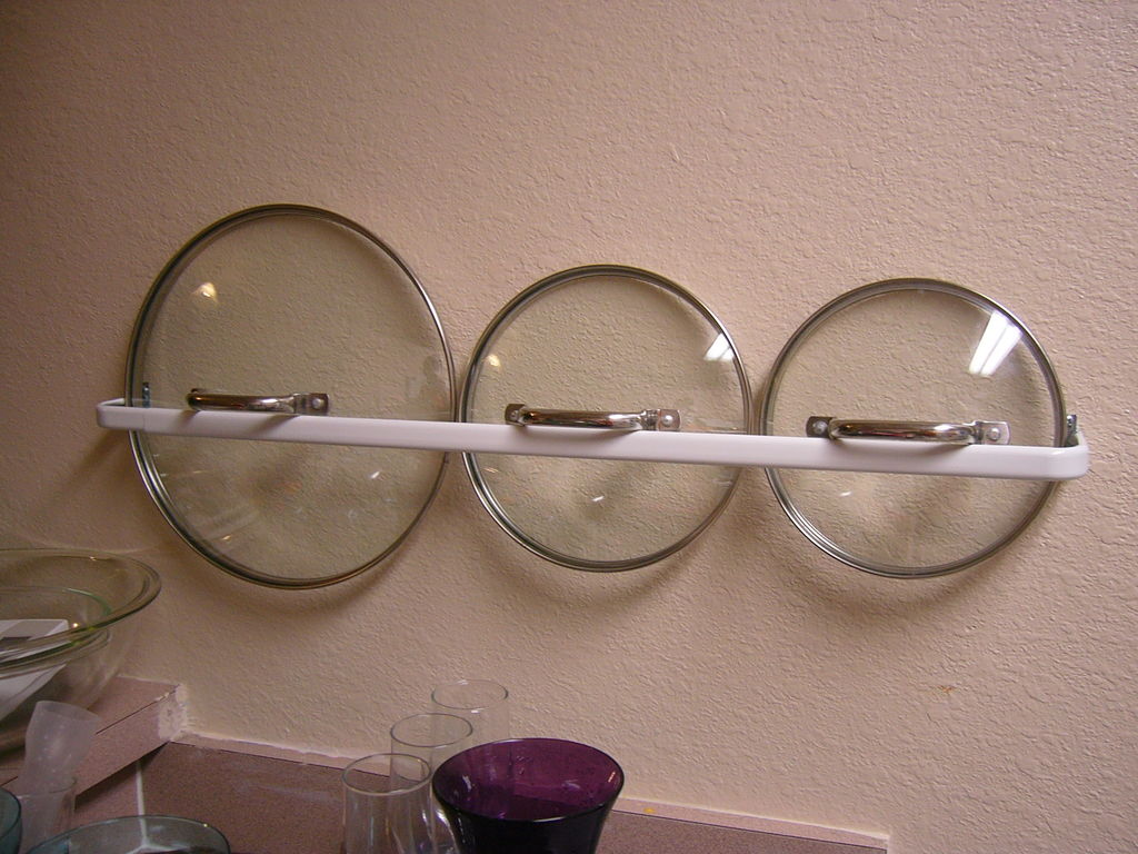 Lid solution from salvaged towel racks.