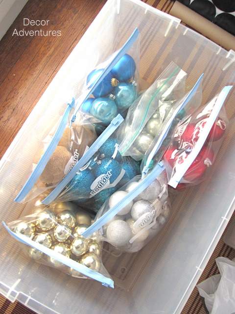 Organize ornaments in zipper bags.