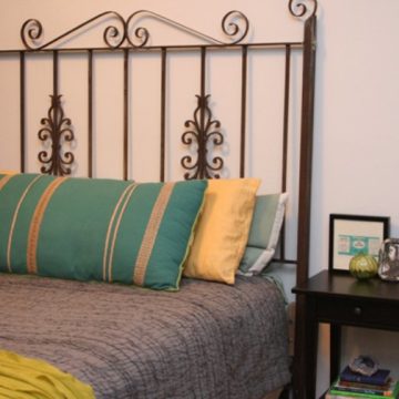 Turn an Old Iron Gate into a Headboard.