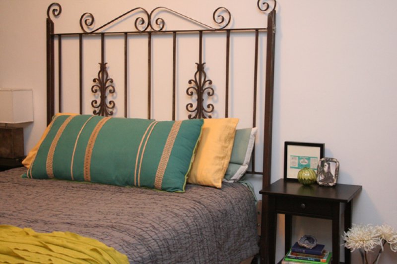 Turn an Old Iron Gate into a Headboard.