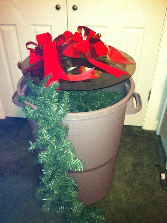Use a clean trash bin to store garlands and outdoor Christmas decor.