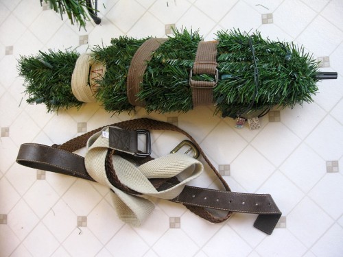 Use old belts to cinch your tree up.