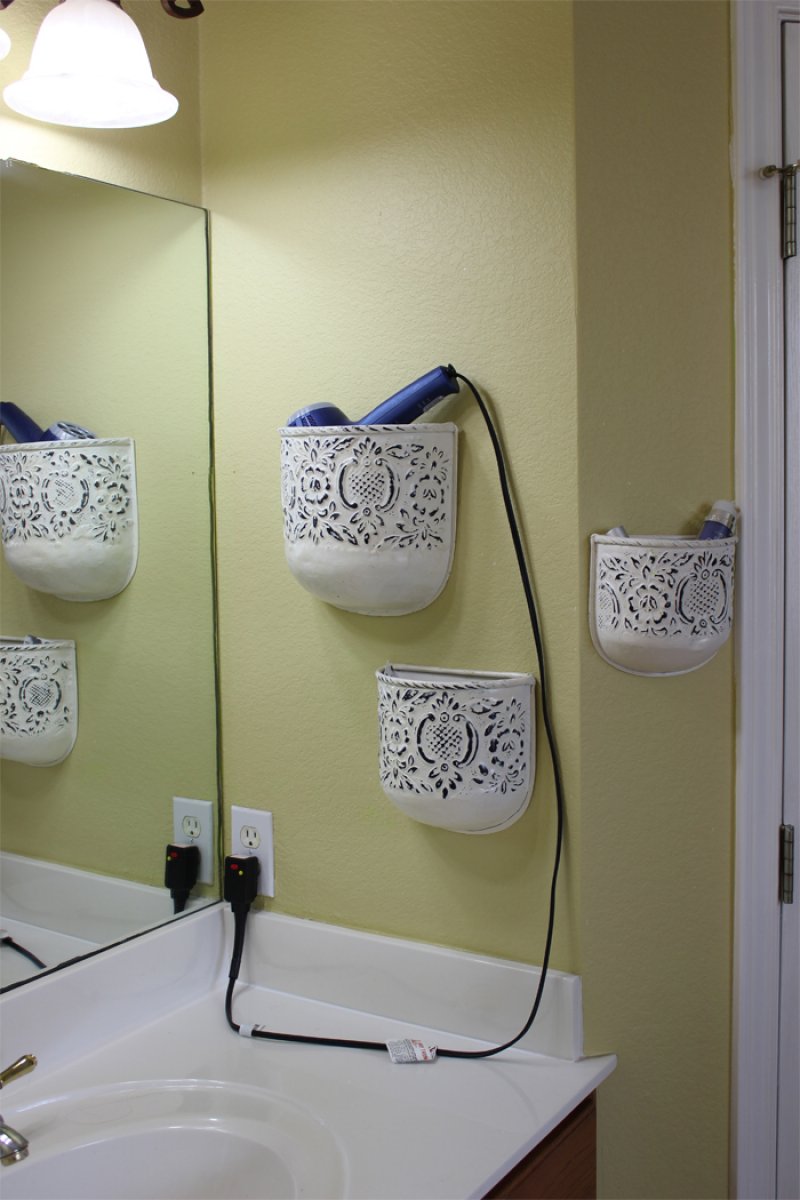 Use plant holders for hair styling supply holders.