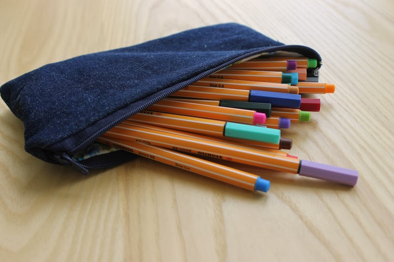 A denim pencil case.