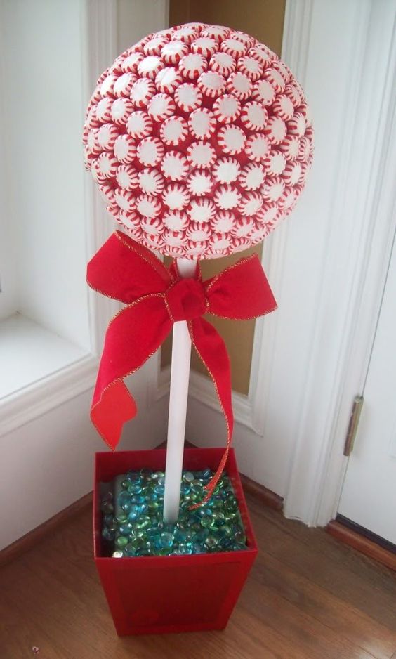 Handmade peppermint candy topiaries for Christmas decoration.