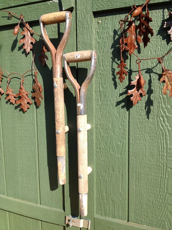 Old shovel handles repurposed as door handles.
