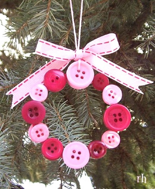 Pretty pink button wreath wit green ribbon.