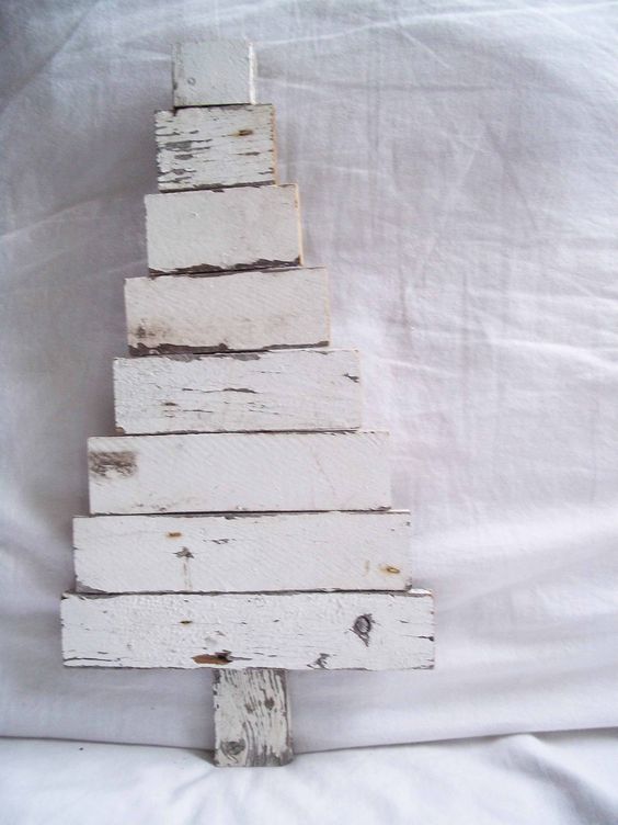 Shabby chic Christmas tree made by reclaimed wood.