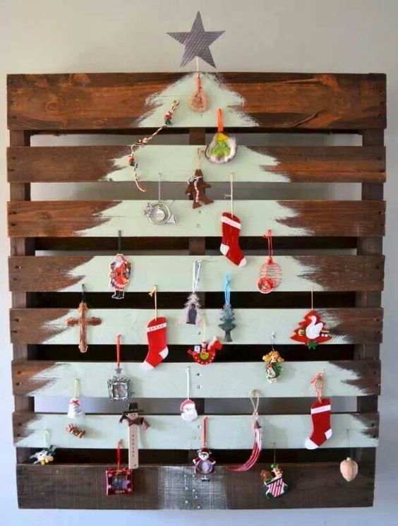 White pallet wood Christmas tree with stars and diy ornaments.
