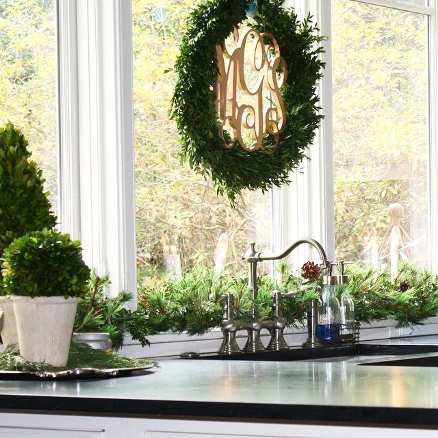 Christmas pinecones garland, topiaries and wreath.