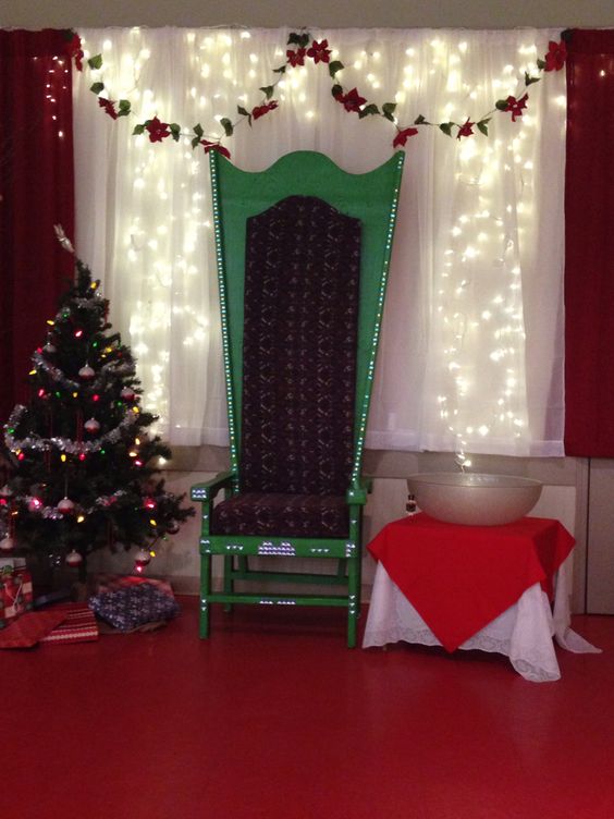 Christmas tree and big green chair for backdrop at Christmas.