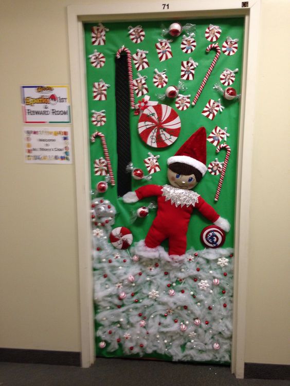 Elf on the shelf decor on classroom door.