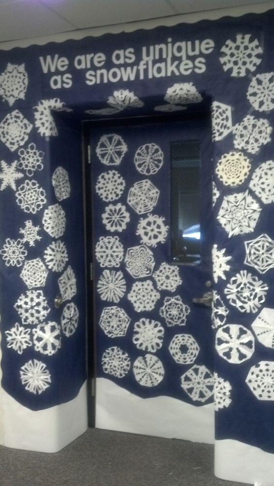 Eye-catching we are unique at snowflakes classroom door decor.