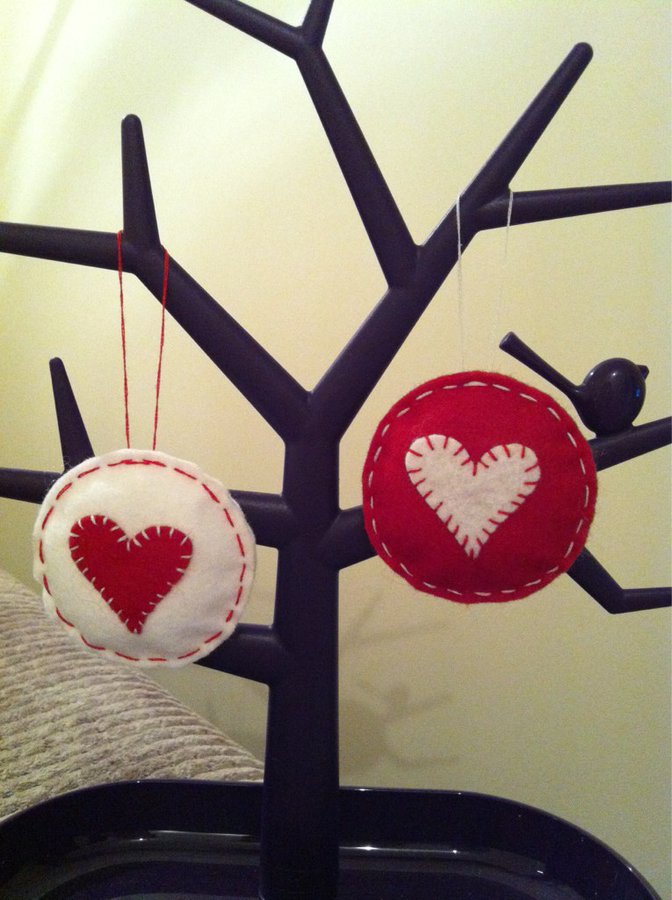 Scandinavian Style Red & White Felt Baubles With Hearts Hanging Christmas Decorations.