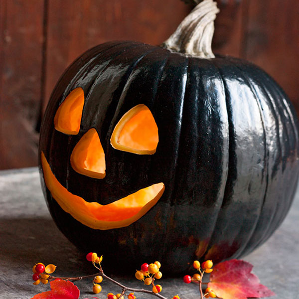 Black Painted Pumpkin carving.