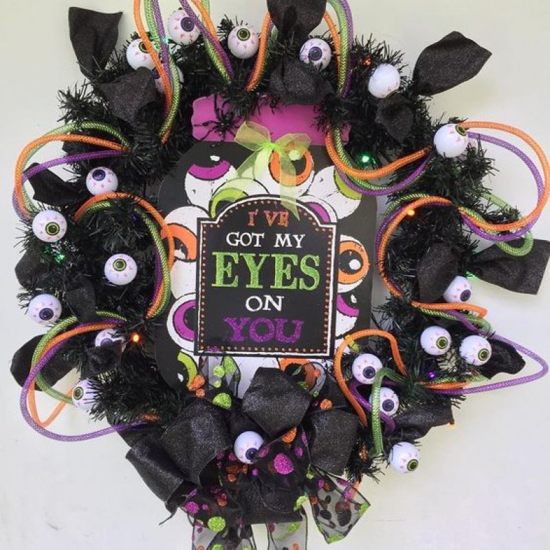Creepy Monster Eyes Black Paper Crafted Hanger for Halloween.