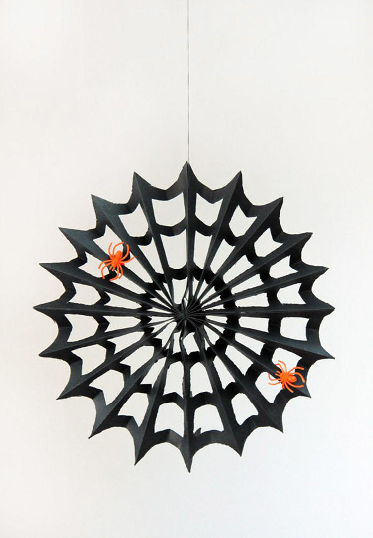 Easy Paper Spiderwebs.