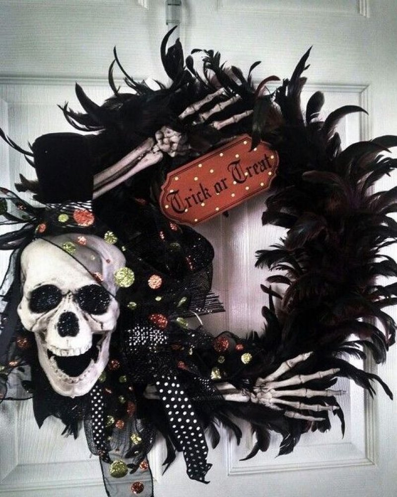 Feather Crafted Wreath with Skull and Hands.