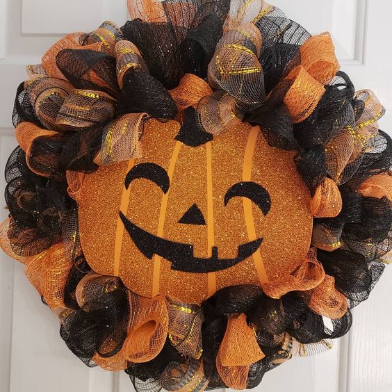 Jack-O-Lantern Wreath with Paper and Burlaps.