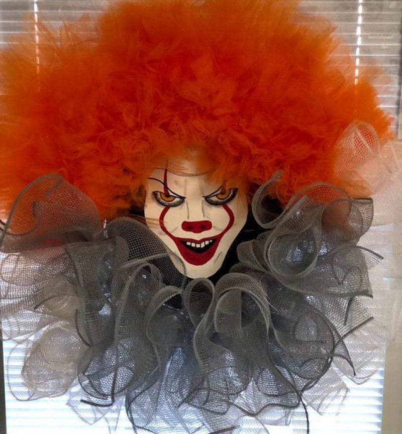 Monster Face with Orange Hair and Burlap Created Cloth Wreath.